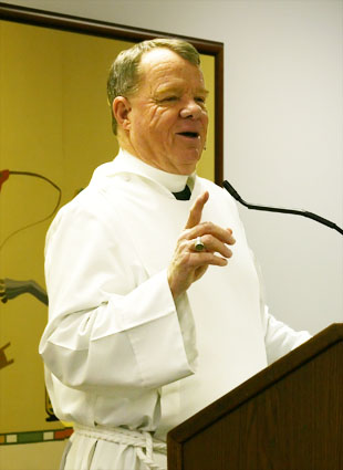 The Rev. Richard Elwood addresses the Prime Timers