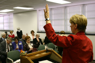 Jackie Rose raises her hand to get our attention.