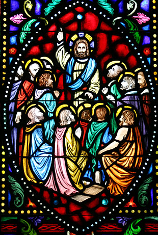 Jesus preaches in stained glass.